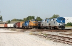 AMTK NB crescent going around a freight train